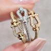 Women's 18K Twisted Multi-Section Luxury Ring with Horseshoe Buckle and Diamonds.