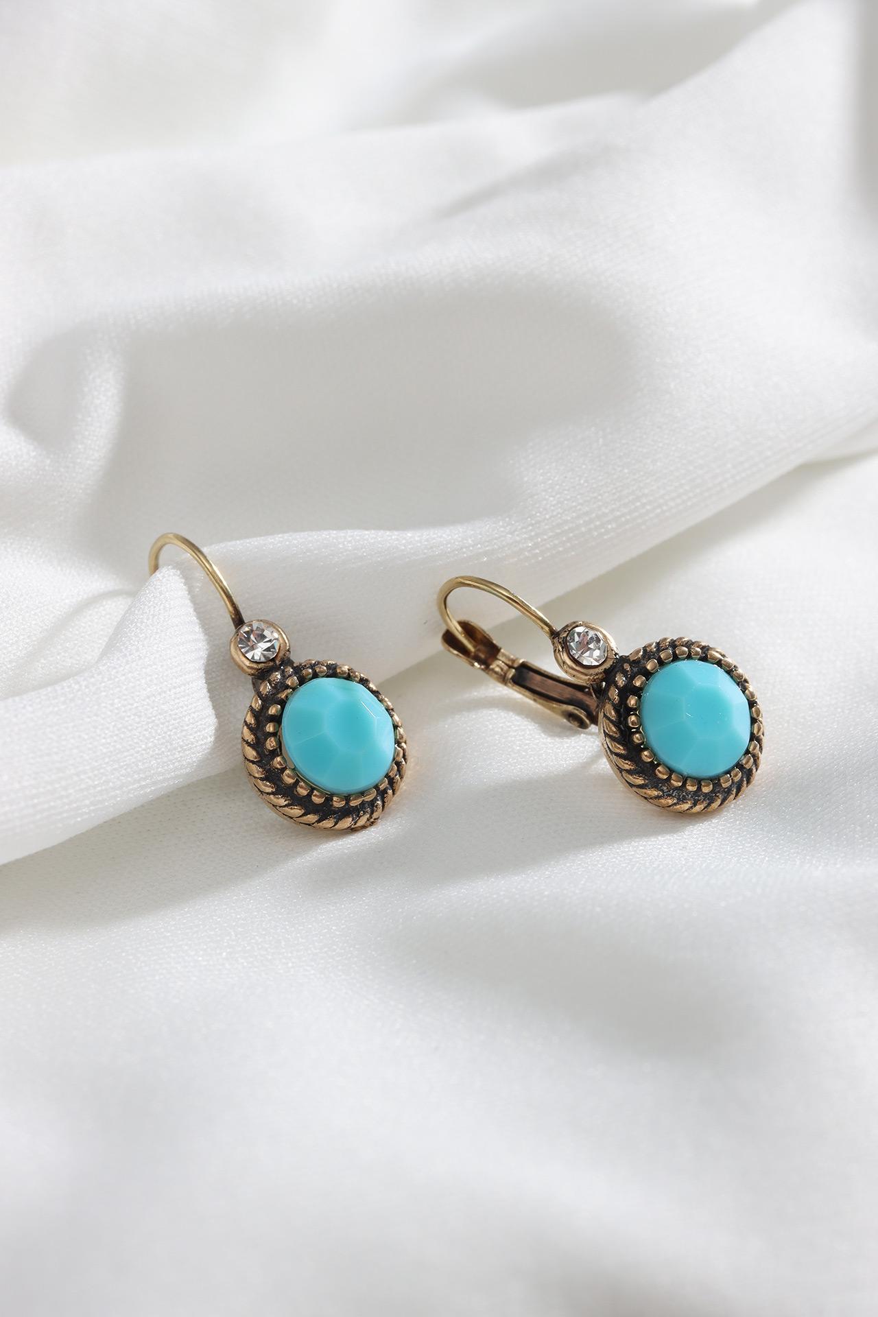 

Аутентичные круглые серьги с синим камнем