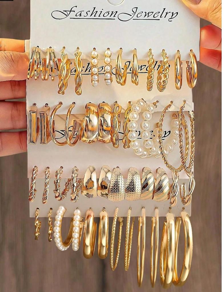 Boucles d'Oreilles Créoles Lisses Torsadées - Design Rétro, Finition Haut de Gamme, Style Niche Riz Sept Grains