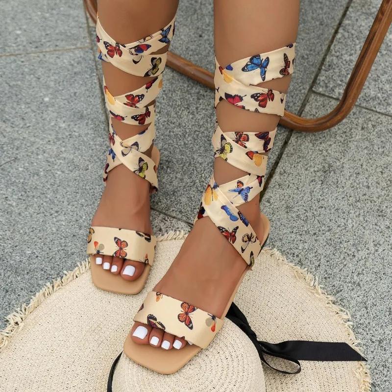 

Мода 2024 года, горячая распродажа обуви для женщин, женские сандалии на шнуровке, летние римские с открытым носком, разноцветные плоские повседневные пляжные сандалии большого размера 39 абрикосовый