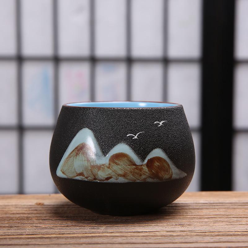 Hand-Painted Black Pottery Zen Tea Cup - Retro Mountain Design, Kung Fu Ceramic Masterpiece for Tea Tasting and Guest Reception.