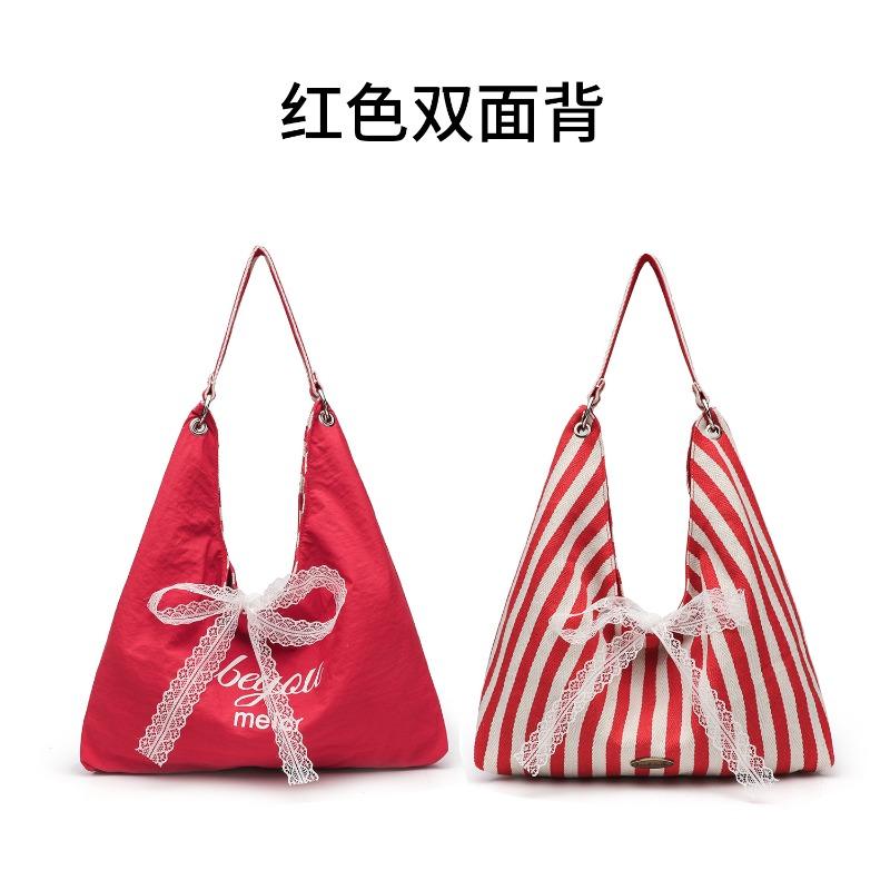 Große gestreifte Tasche doppelseitige Tragetasche Pendler Canvas Tasche Unterarm Wind Pendler Damen Kapazität Student Schultertasche