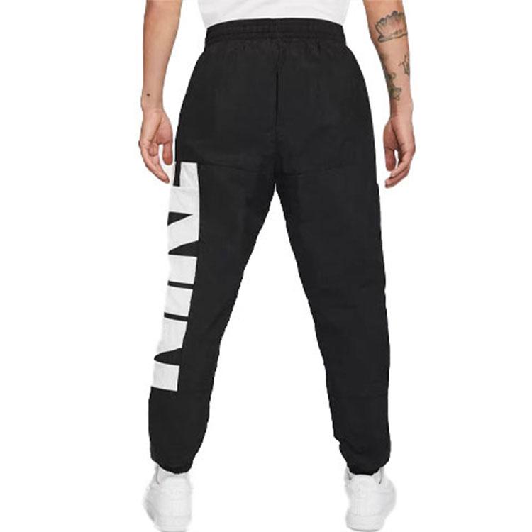 Nike Pantalón de chándal deportivo de entrenamiento con estampado de logotipo y malla transpirable para hombre Negro CW7352-010