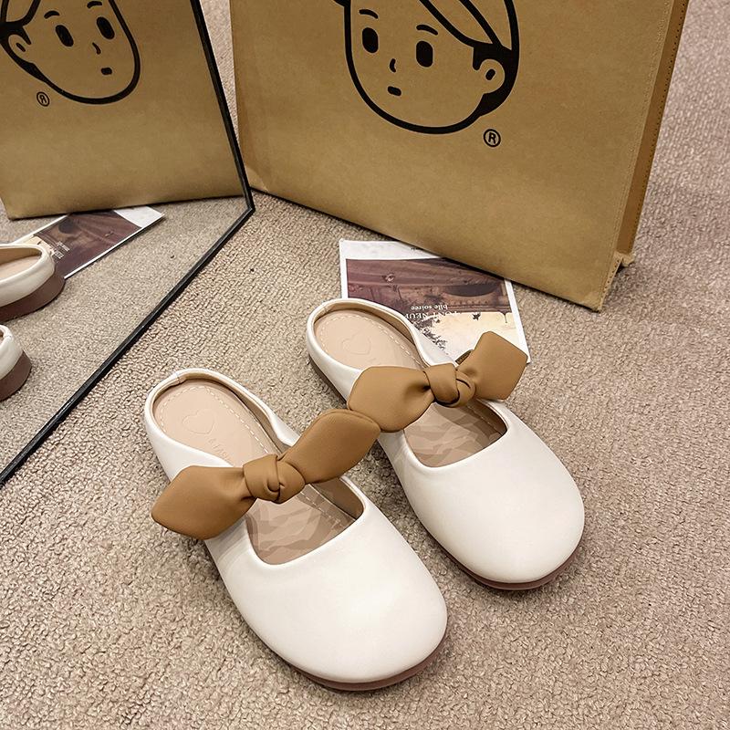 

Baotou half slippers women s outer wear 2025 new summer explosion French fairy style bow soft bottom maternity sandals 35