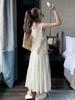 Trendy White Hollow Camisole Dress Set: Flattering Two-Piece Layered Vest & Dress