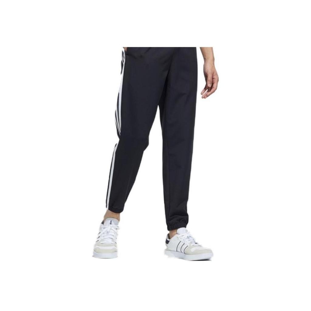 adidas Spodnie dresowe męskie Neo z bocznym paskiem, czarne HD4717