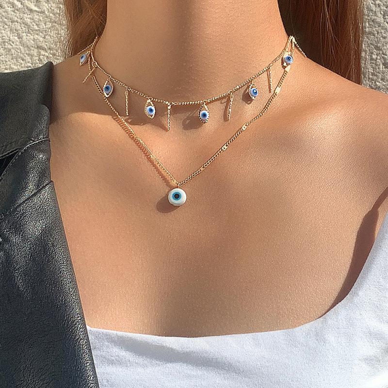 Jewelry, light luxury diamond-set, blue devil s eye pendant, collarbone chain, temperament imitation pearl necklace, female