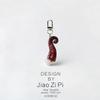 Quirky Squid Tentacle Keychain Pendant: Creative Backpack Ornament & Funny Accessory