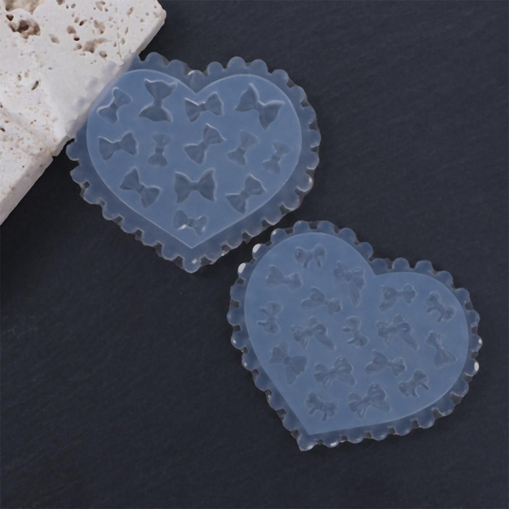 

Cute Transparent 3D Bow Heart DIY Nail Mold Silicone Stencils Stamping Plate Nail Art Templates AM-4