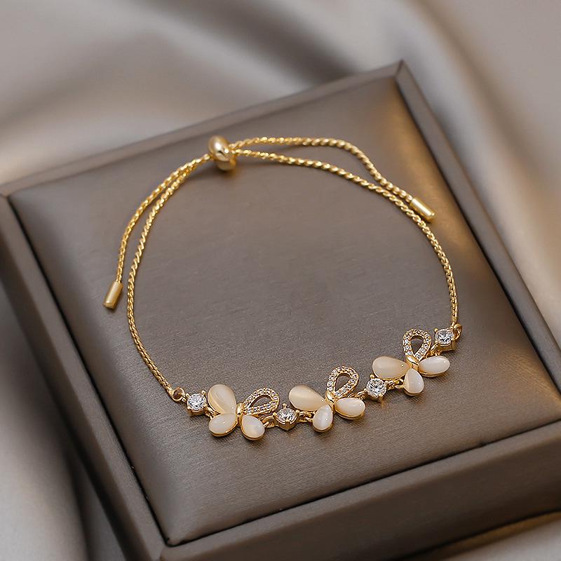 Stylish Diamond and Zircon Butterfly Bracelet with Cat s Eye Inlay