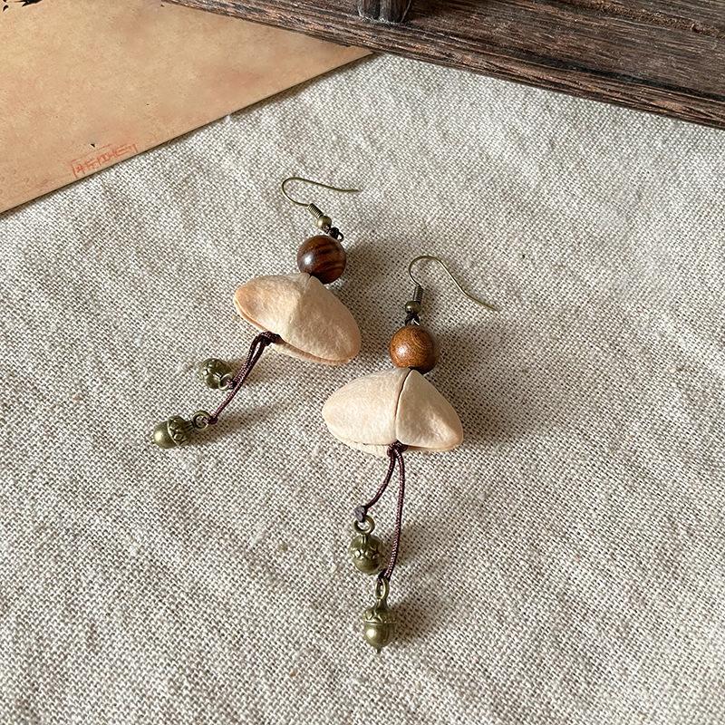 

Wood bead fruit core hazelnut pendant fringed earrings retro literary temperament earrings women s earrings design sense niche