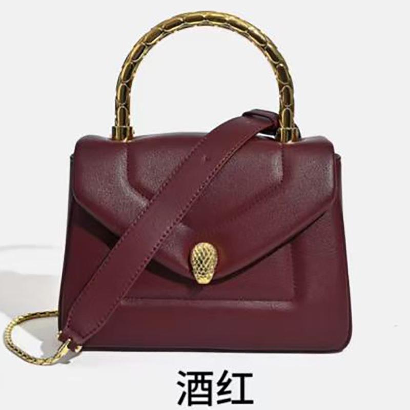 New leather women's bags, high-end cowhide bags, fashionable and versatile snake head portable messenger bags