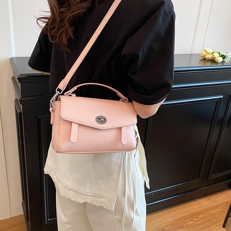 Summer new fashionable solid color lock flip bag versatile portable shoulder oblique span women's bag