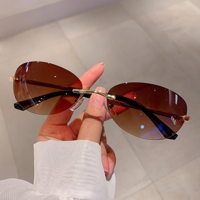 Fashion Vintage Luxury  Designer Rimless Oval Sunglasses Women For Men Sun Glasses Punk Popular UV400 Small Shades