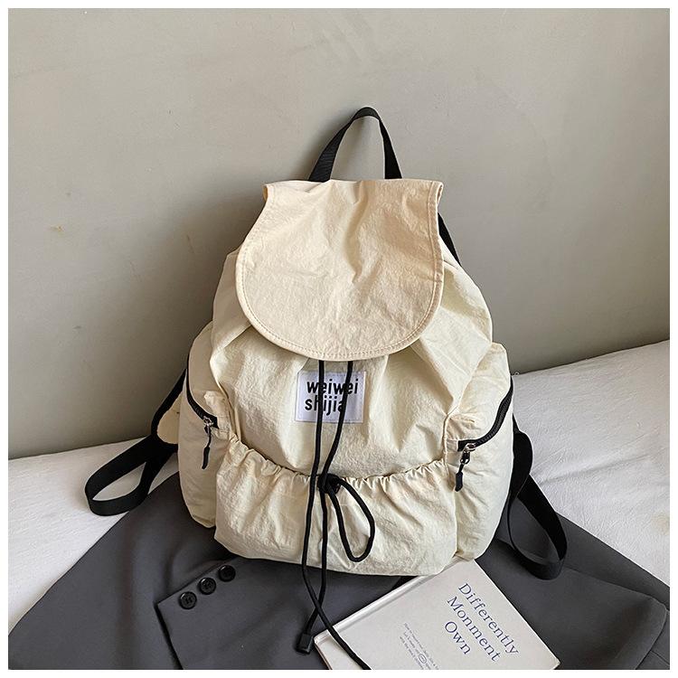 

Модный рюкзак осень 2025, практичный, большой вместимости, на шнурке, нишевый, повседневный, унисекс, из стираной ткани