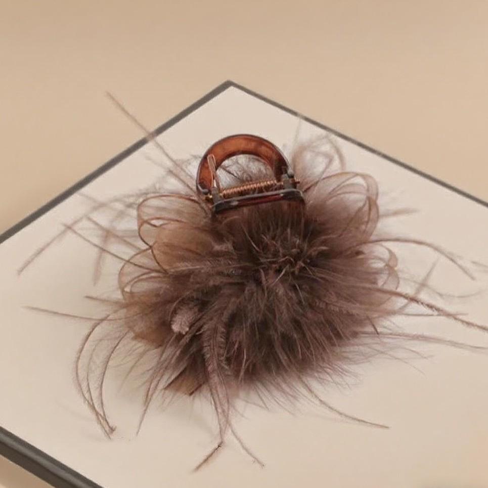 Eleganter Damen-Haarclip für mittellanges Haar mit Design aus schwarzen und kaffeefarbenen Federkrallen