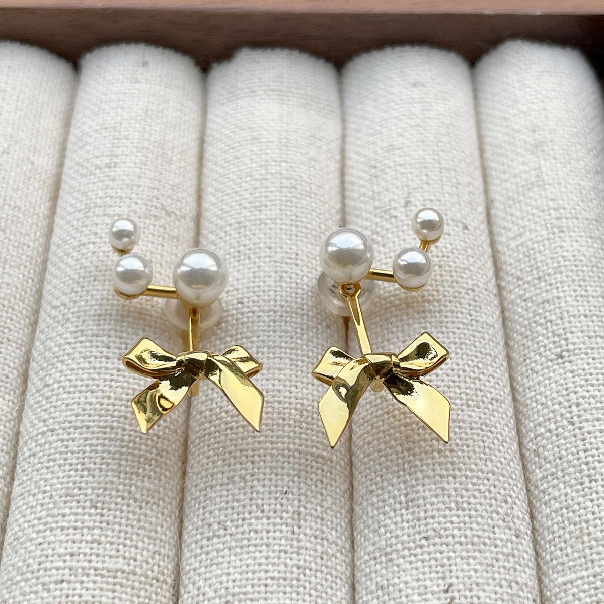 

Xiaoxiangfeng sweet bow silver needle stud earrings women s exquisite rear hanging pearl earrings New Year s earrings 925 silver needle