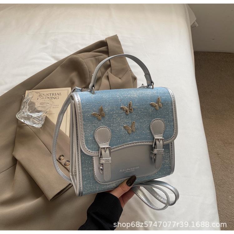 

Student class backpack female Korean version retro fashion butterfly small backpack 2025 niche simple trend student bag