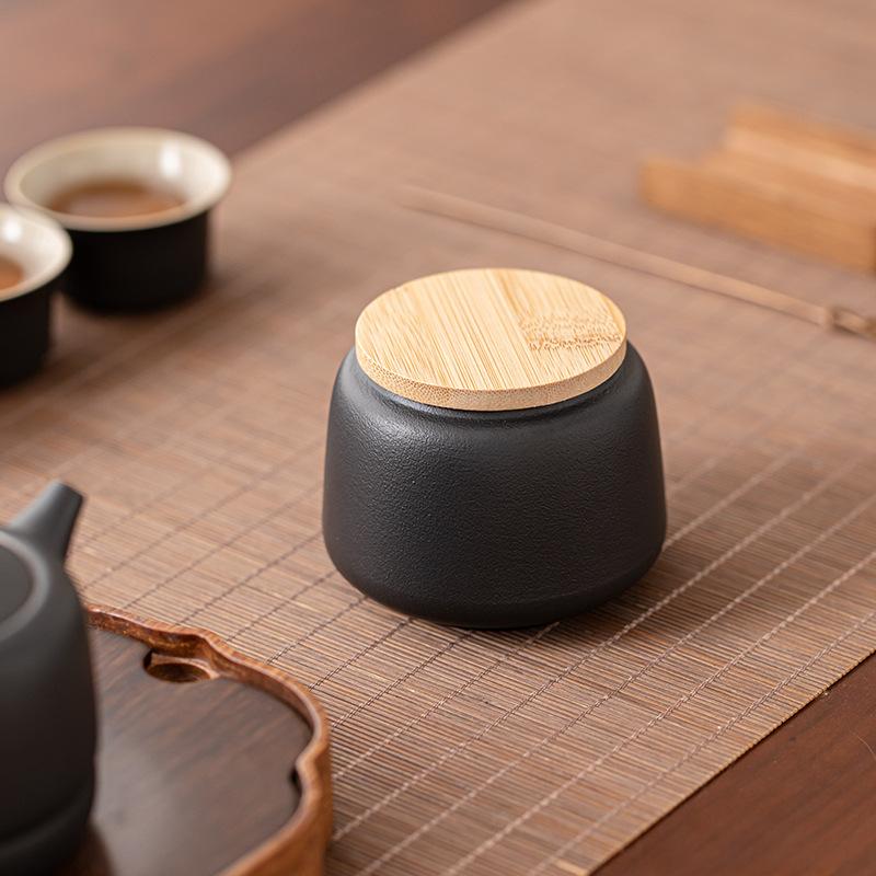 

Черная керамическая банка для чая, герметичная банка для хранения чая, емкость для хранения чая Пуэр, черного чая, влагостойкая, портативная, из грубой керамики, маленькая банка для чая