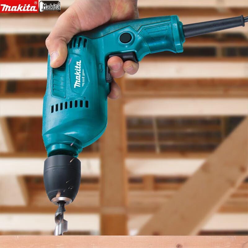 Makita M0601B Sladdburen Elektrisk Borrmaskin med Variabel Hastighet CN-kontakt (adapter ingår)