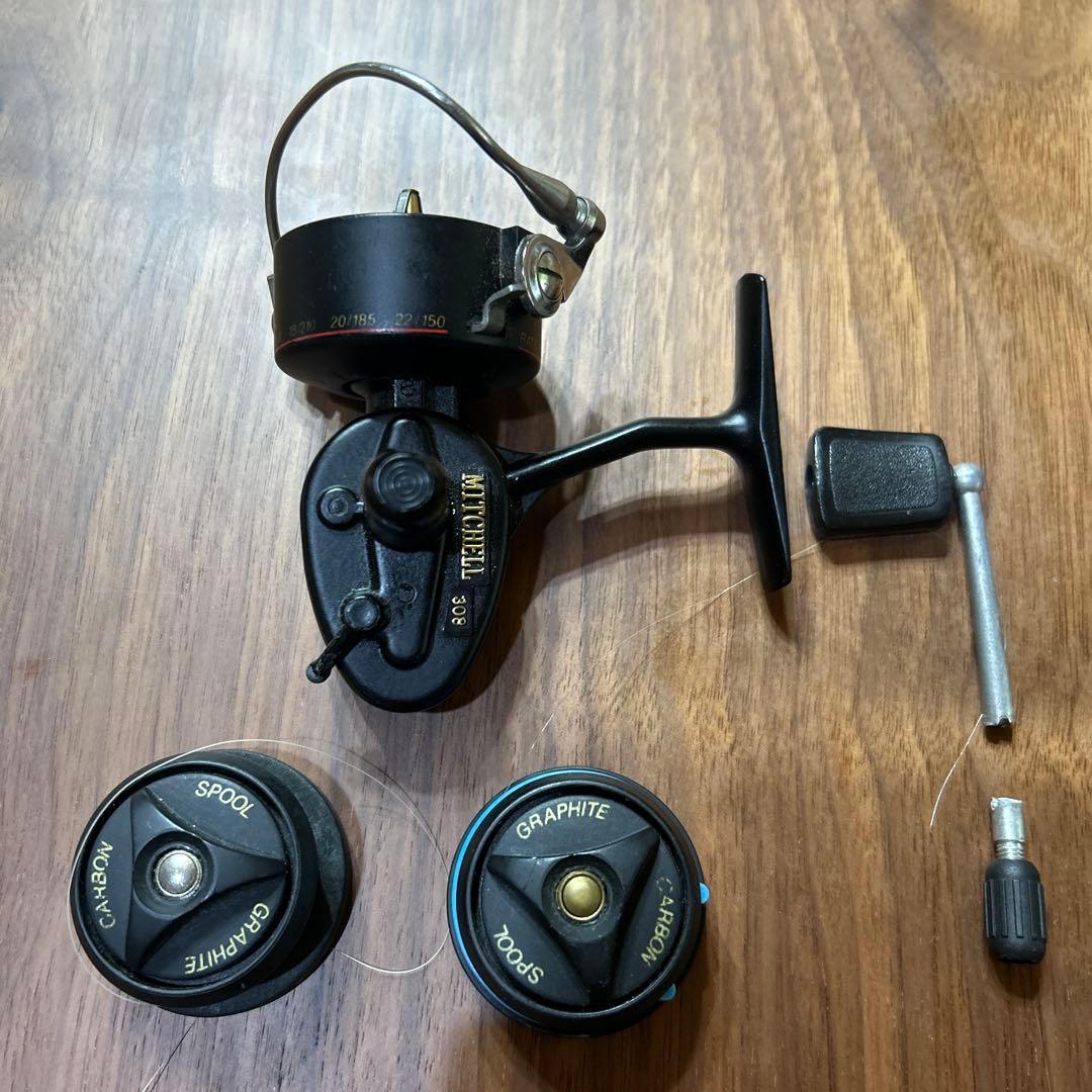 Used Junk Mitchell 308 spinning reel with replacement spool
