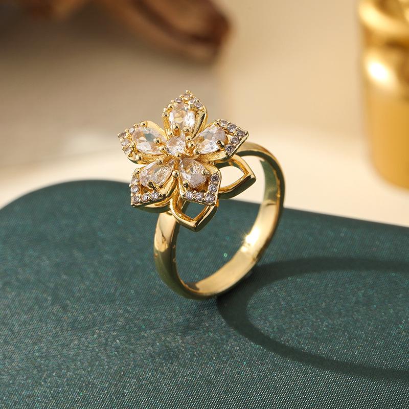 

Трендовое вращающееся кольцо с цирконом в виде четырехлистного клевера – элегантное и универсальное украшение для женщин