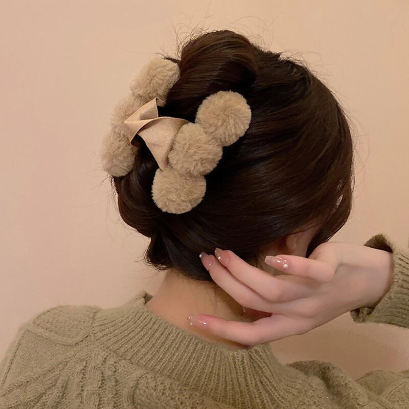 

Fluffy fake fur updo with half-up hair clip gray
