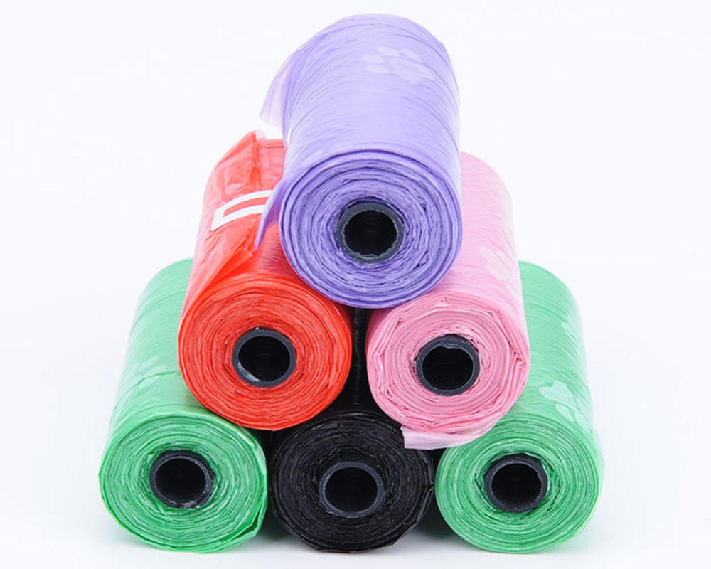 Pet Waste Bags with Paw Print Design Leakproof Durable Rolls for Dog and Cat Cleanup Multipack for Home or Outdoor Use