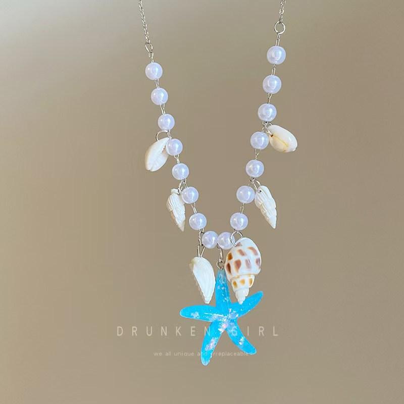 Summer starfish shell necklace niche design sense dopamine imitation pearl white collarbone chain seaside vacation photo