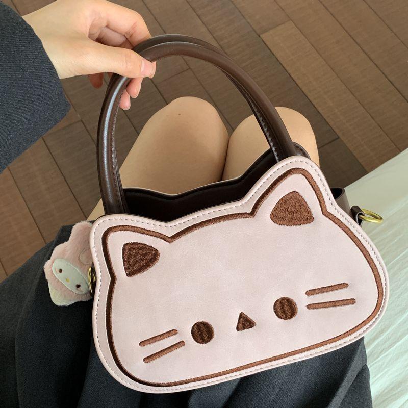 

Kitten handbag cute new shoulder autumn and winter fashion cartoon messenger bag funny bag woman рожевий