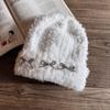 Knitted Winter Hat For Women With Plush Material And High Top Design For Cold Weather Comfort