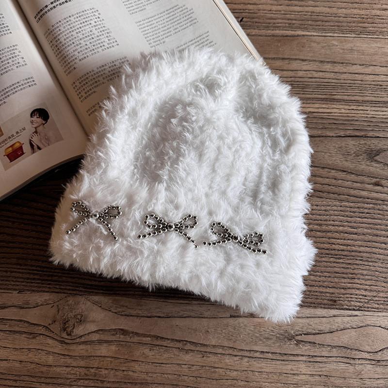 Knitted Winter Hat For Women With Plush Material And High Top Design For Cold Weather Comfort