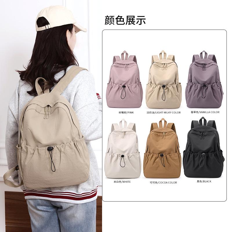 Solid color nylon backpack large capacity casual simple college students men and women with the same versatile lightweight backpack