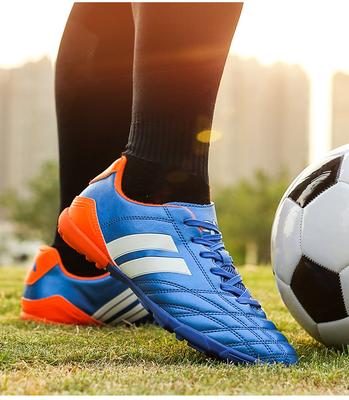Direktverkauf neuer Kinderfußballschuhe für Herren und Damen mit niedrigen Spikes aus Gummi und Gras, Sporttrainingsschuhe