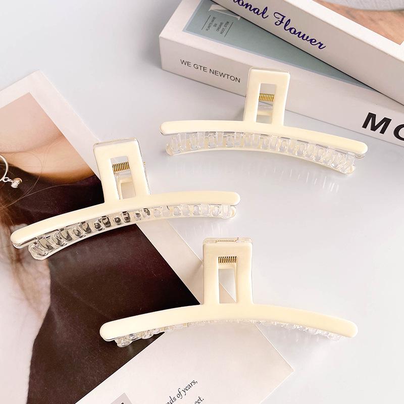 

White One-Word Claw Clip: Enhance Hair Volume & Style