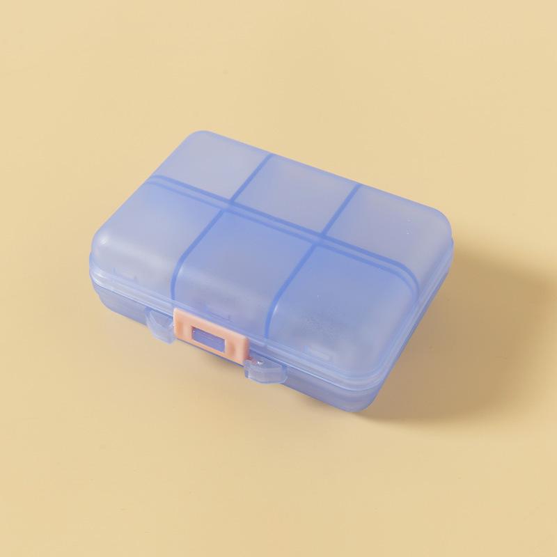 Pilulier portable compact à double couche avec 10 compartiments pour un rangement sécurisé des médicaments