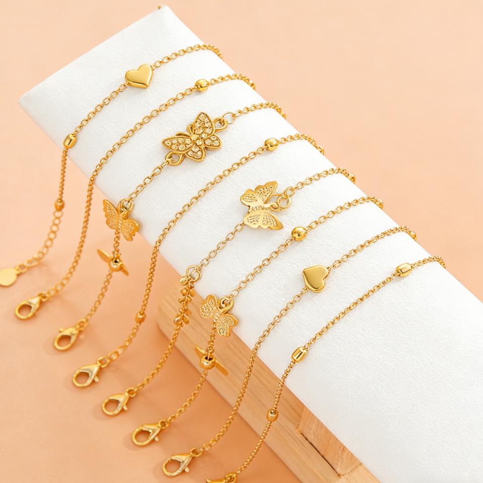4-piece Gold Butterfly Multi-layer Anklet Set, Creative Beaded Heart Chain Anklet, Suitable for Vacation and Beach Wear.
