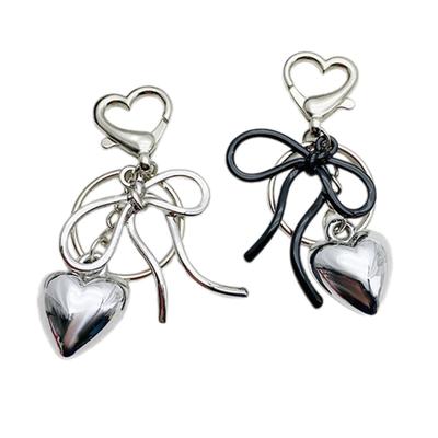 Schlüsselanhänger mit Herzanhänger aus Metall mit Schleife, einfacher Anhänger, Auto-Schlüsselring, Rucksack-Dekoration, Modeschmuck für Frauen und Mädchen