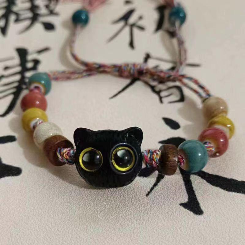 

Милый браслет с мультяшным котом для женщин и девочек, креативные красочные регулируемые плетеные браслеты из веревки, уникальные браслеты с подвесками в виде кота и бисера