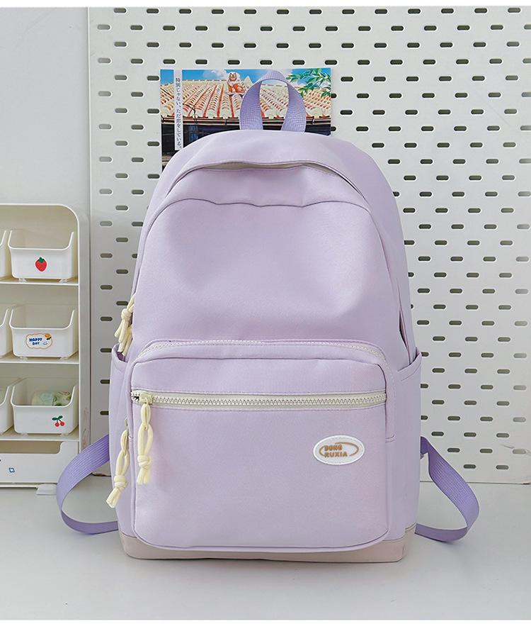 

Backpack Junior high school student large-capacity campus leisure school bag nylon outdoor simple sports travel backpack computer bag фіолетовий