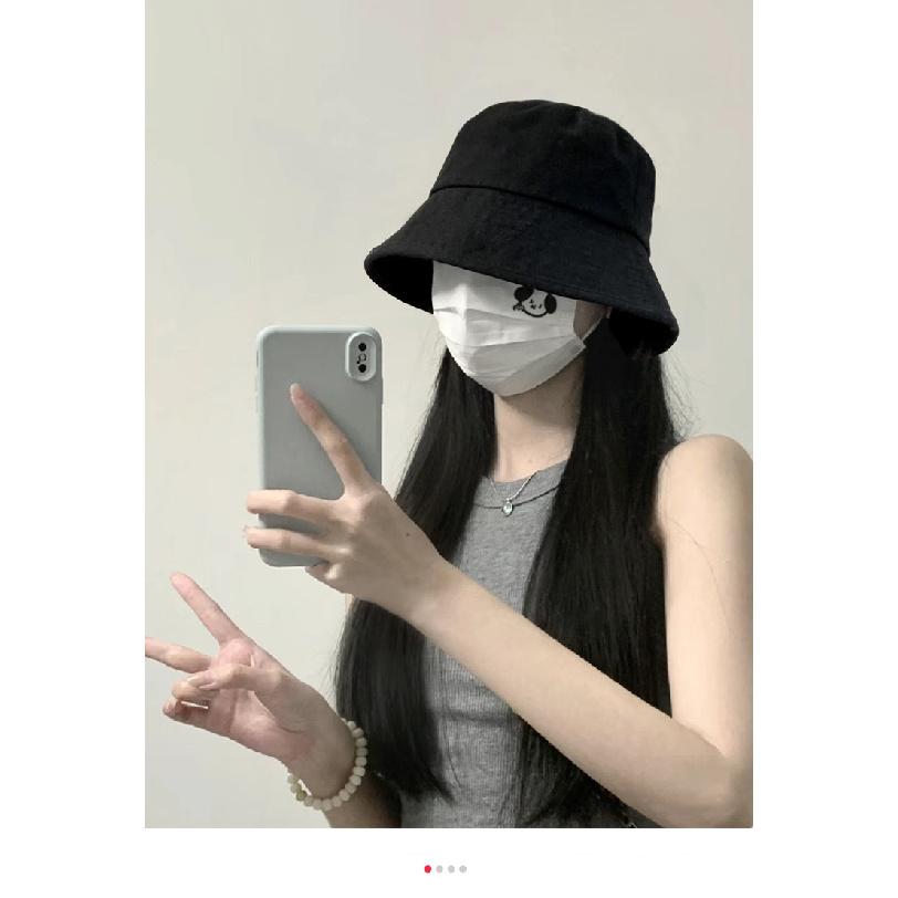 Black fisherman hat for women, oversized design, stylish and sun-protective, bucket hat