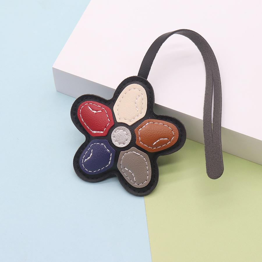 PU leather cute flower bag decorative charm fashionable simple new wave doll jewelry buckle head light luxury wind bag hanging