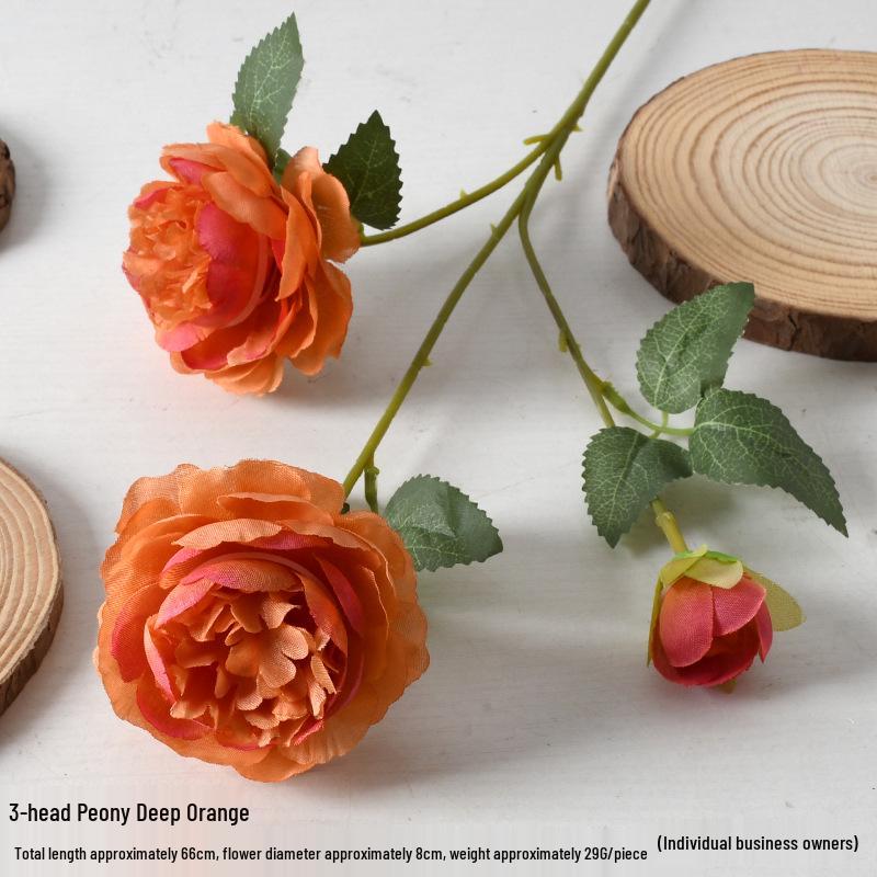 Hochzeitsgang-Simulations-Blumenarrangement mit Orangenthema - Künstliche Heimdekor-Reihenblumen