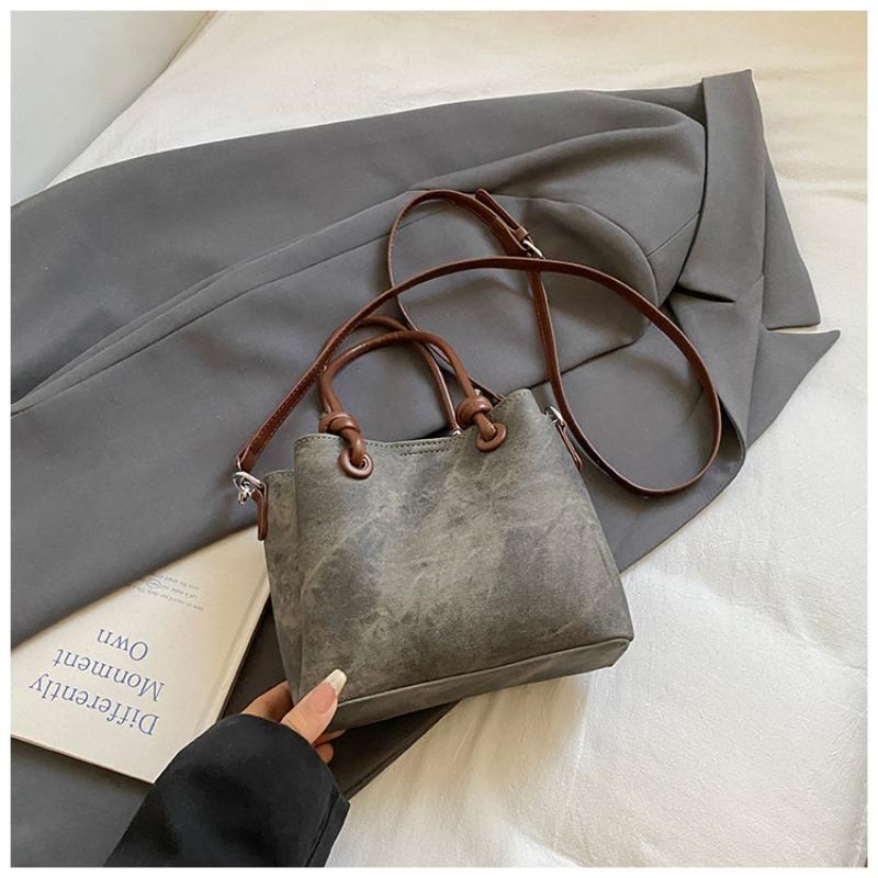 

Autumn and winter retro high-end sense high-end bag women s new fashion and popular versatile messenger bucket bag