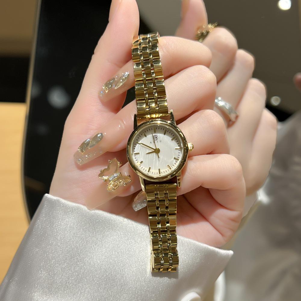 

Элегантные женские кварцевые часы с перламутровым циферблатом и стальным браслетом