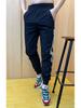 Men's Stylish Ice Silk Quick-Dry Harem Pants - Spliced, Fashionable, Versatile, and Trendy for Spring and Summer.