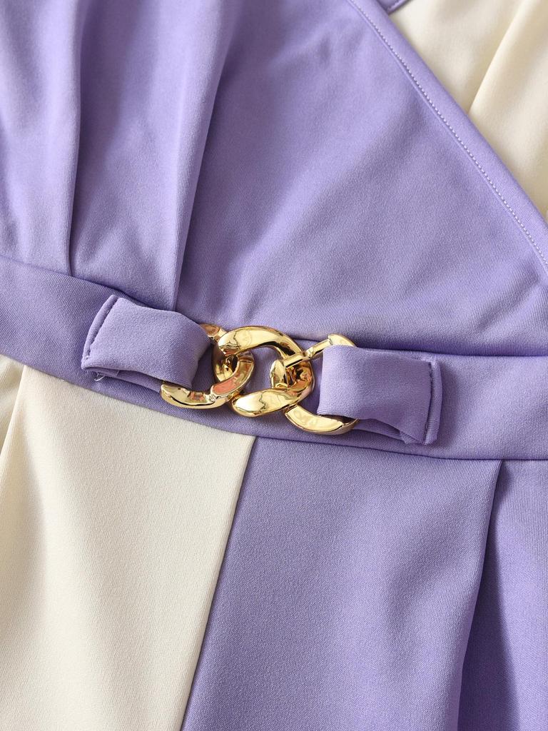 Women's Autumn Fashion Set: White Jacket with Pearl Buttons & Color Block Jumpsuit with Metal Chain Trim.