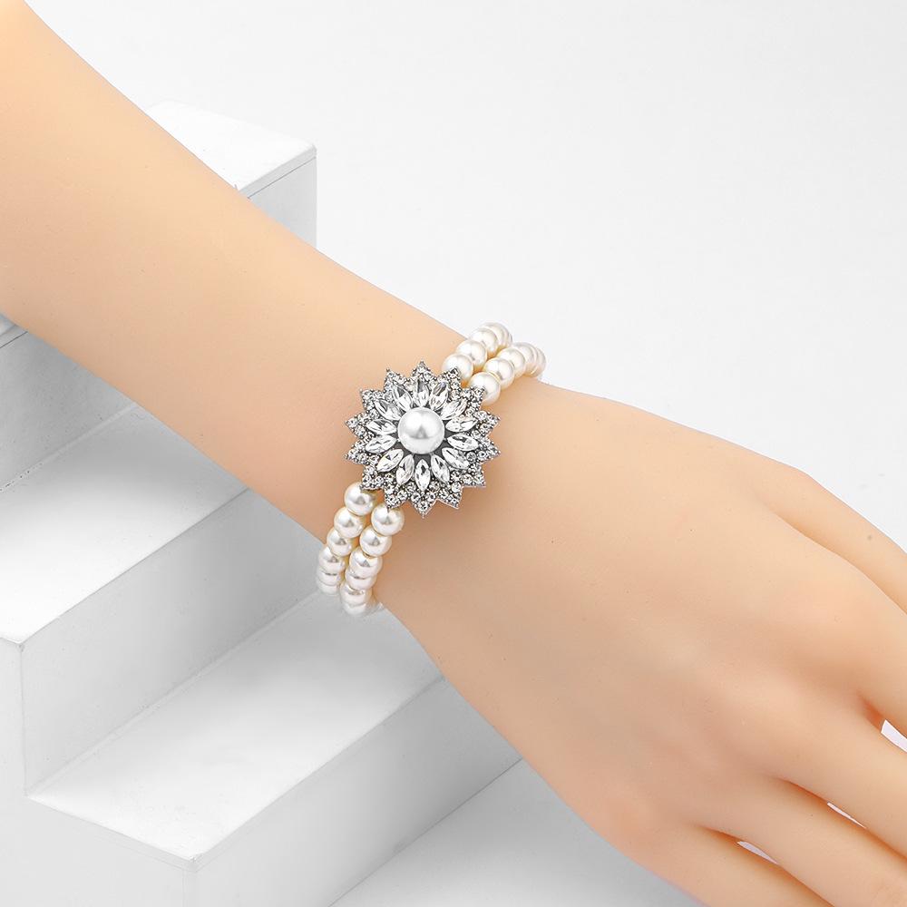 Elegant Imitation Pearl Jewelry Set: Necklace, Earrings & Bracelet for Prom, Party, Vacation, or Bridal Gown.