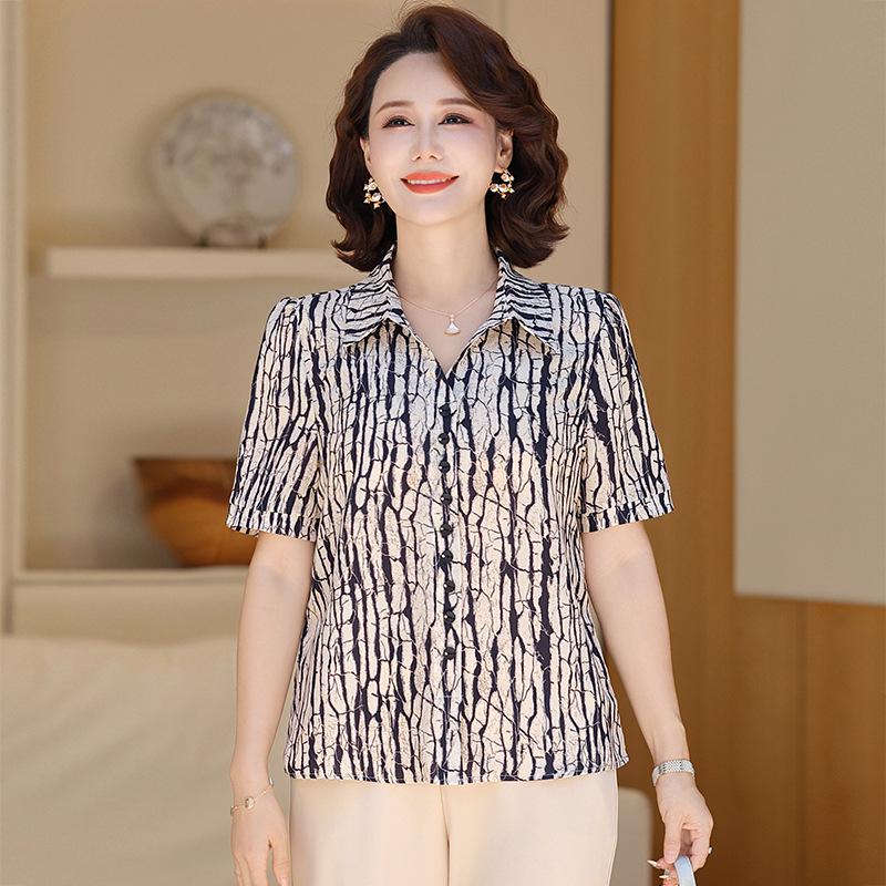 

Stylish Printed Short-Sleeve Summer Blouse for Middle-Aged and Elderly Women - Loose, Belly-Concealing Top XL (recommended 85-100 jin) темно-синього кольору