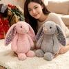 Peluche coniglio con orecchie lunghe e morbide 15 25 30 cm Bambola animale colorata dei cartoni animati Compagno per dormire Ciondolo
